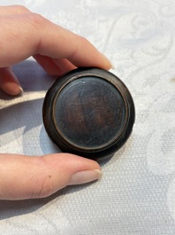A Chinese celadon jade covered vase, with wooden stand, and a bowl with wooden cover and stand, 19/20th C.