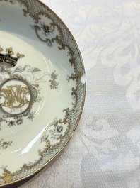 Four sets of Chinese export grisaille and gilt-decorated handled cups and saucers with crowned monograms, Qianlong