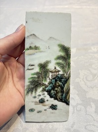 A set of four Chinese famille rose 'Landscape' plaques mounted in a wooden frame, signed Wang Yunquan 王雲泉, together with four plaques, 20th C.