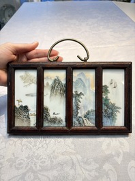A set of four Chinese famille rose 'Landscape' plaques mounted in a wooden frame, signed Wang Yunquan 王雲泉, together with four plaques, 20th C.