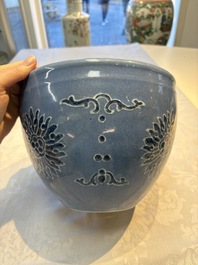 A Chinese blue and white scroll pot with Buddhist flower design, 18/19th C.