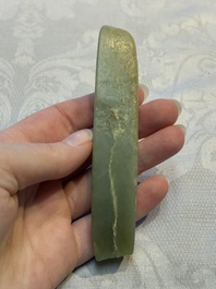 A Chinese celadon jade snuff bottle, a plaque and a ritual stick, Han and later