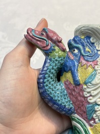 A Chinese famille rose ewer in the form of a dragon and two carps with wooden cover and stand, 19th C.