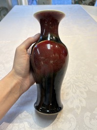 A Chinese blue-glazed jar and a flamb&eacute;-glazed vase, 19/20th C.