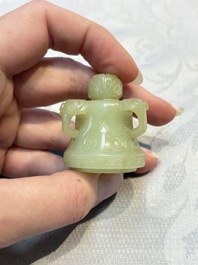 A Chinese celadon jade covered vase, with wooden stand, and a bowl with wooden cover and stand, 19/20th C.