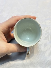 Four sets of Chinese export grisaille and gilt-decorated handled cups and saucers with crowned monograms, Qianlong