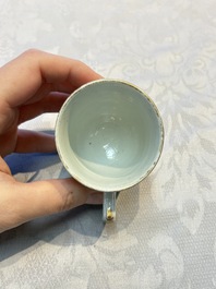 Four sets of Chinese export grisaille and gilt-decorated handled cups and saucers with crowned monograms, Qianlong