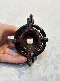 A Chinese celadon jade covered vase, with wooden stand, and a bowl with wooden cover and stand, 19/20th C.