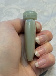 A Chinese celadon jade snuff bottle, a plaque and a ritual stick, Han and later