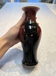 A Chinese blue-glazed jar and a flamb&eacute;-glazed vase, 19/20th C.