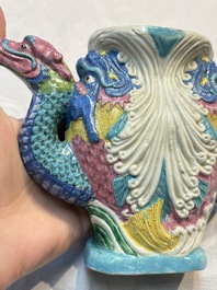 A Chinese famille rose ewer in the form of a dragon and two carps with wooden cover and stand, 19th C.