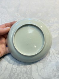 Four sets of Chinese export grisaille and gilt-decorated handled cups and saucers with crowned monograms, Qianlong