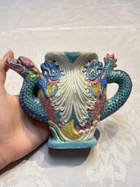 A Chinese famille rose ewer in the form of a dragon and two carps with wooden cover and stand, 19th C.