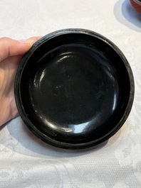 Two Chinese cinnabar lacquer covered boxes and a bottle vase, 19th C.