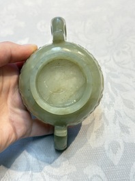 A Chinese celadon jade covered vase, with wooden stand, and a bowl with wooden cover and stand, 19/20th C.