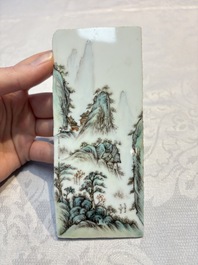 A set of four Chinese famille rose 'Landscape' plaques mounted in a wooden frame, signed Wang Yunquan 王雲泉, together with four plaques, 20th C.