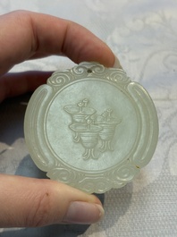 A Chinese celadon jade snuff bottle, a plaque and a ritual stick, Han and later