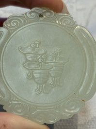 A Chinese celadon jade snuff bottle, a plaque and a ritual stick, Han and later