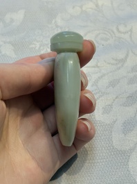A Chinese celadon jade snuff bottle, a plaque and a ritual stick, Han and later