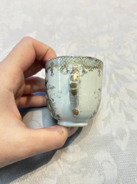 Four sets of Chinese export grisaille and gilt-decorated handled cups and saucers with crowned monograms, Qianlong