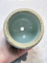 A pair of Chinese blue and white 'Dragons Chasing the Flaming Pearl&rsquo; candlesticks, 19th C.