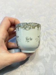 Four sets of Chinese export grisaille and gilt-decorated handled cups and saucers with crowned monograms, Qianlong