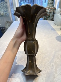 A Chinese gold-splashed bronze 'Gu' vase, Xuande mark, 17/18th C.