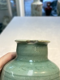 A Chinese Longquan celadon vase with incised floral design, Transitional period