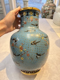 A pair of Chinese cloisonn&eacute; 'Magpies' vases and a 'Lotus Scroll' plaque, 19th C.