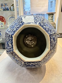 A large Japanese Arita blue and white octagonal vase with figural design, Edo, 17/18th C.