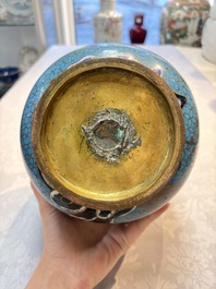 A pair of Chinese cloisonn&eacute; 'Magpies' vases and a 'Lotus Scroll' plaque, 19th C.