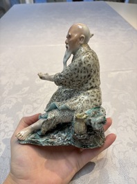 A Chinese verte biscuit vase, a sculpture of a fisherman and a Milefo Buddha, You Lin Ji 游林記造 and Zhu Mao Ji 朱茂記造 mark, 20th C.