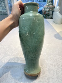 A Chinese Longquan celadon vase with incised floral design, Transitional period