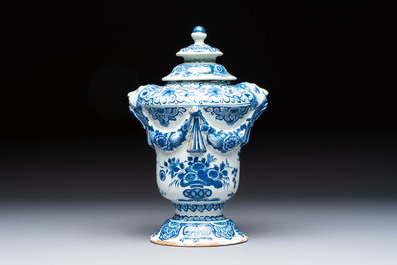 A blue and white Dutch Delft urn-shaped table fountain and cover, early 18th C.
