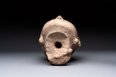 A Chinese sandstone head of a Luohan, early Qing