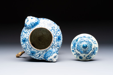 A blue and white Dutch Delft urn-shaped table fountain and cover, early 18th C.