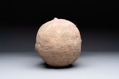 A Chinese sandstone head of a Luohan, early Qing