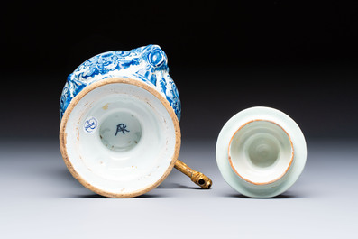 A blue and white Dutch Delft urn-shaped table fountain and cover, early 18th C.