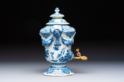 A blue and white Dutch Delft urn-shaped table fountain and cover, early 18th C.