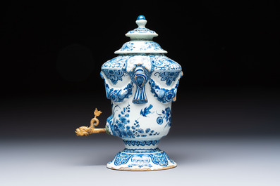 A blue and white Dutch Delft urn-shaped table fountain and cover, early 18th C.