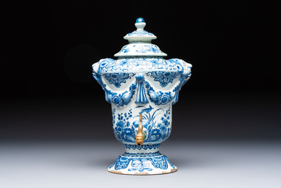 A blue and white Dutch Delft urn-shaped table fountain and cover, early 18th C.