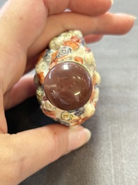 Four Chinese snuff bottles and three vases, 19th C.