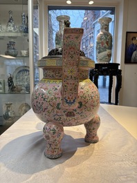 An impressive Chinese famille rose 'Bajixiang and Lotus Scroll' tripod censer with a wooden cover, Jiaqing mark and of the period