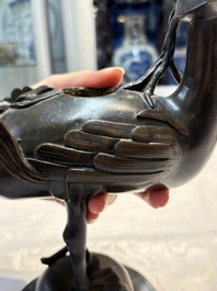 A pair of Chinese bronze duck-form censers, 17/18th C.