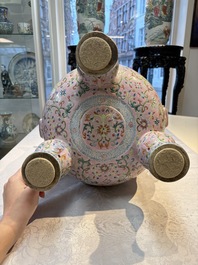 An impressive Chinese famille rose 'Bajixiang and Lotus Scroll' tripod censer with a wooden cover, Jiaqing mark and of the period