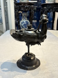 A pair of Chinese bronze duck-form censers, 17/18th C.