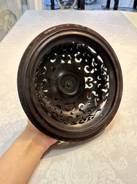 An impressive Chinese famille rose 'Bajixiang and Lotus Scroll' tripod censer with a wooden cover, Jiaqing mark and of the period