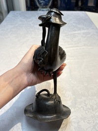 A pair of Chinese bronze duck-form censers, 17/18th C.