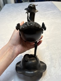 A pair of Chinese bronze duck-form censers, 17/18th C.