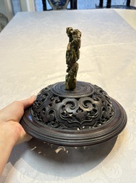 An impressive Chinese famille rose 'Bajixiang and Lotus Scroll' tripod censer with a wooden cover, Jiaqing mark and of the period